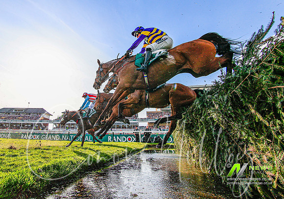 Corach Rambler goes over the water jump, Aintree 2023
