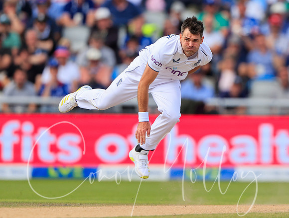 James Anderson in bowling action.