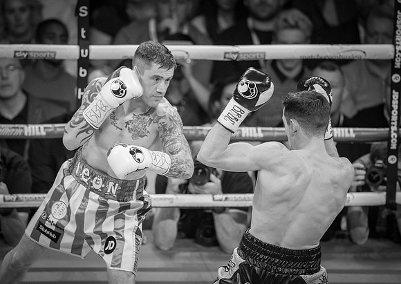 Burns tries to land a punch