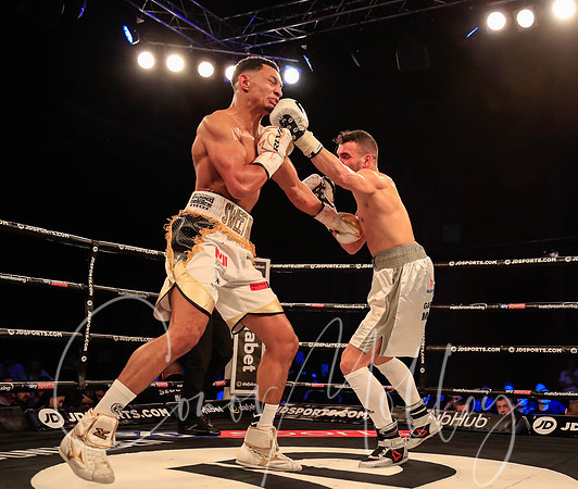 Fernando Heredia lands a left hand on Marcus Morrison
