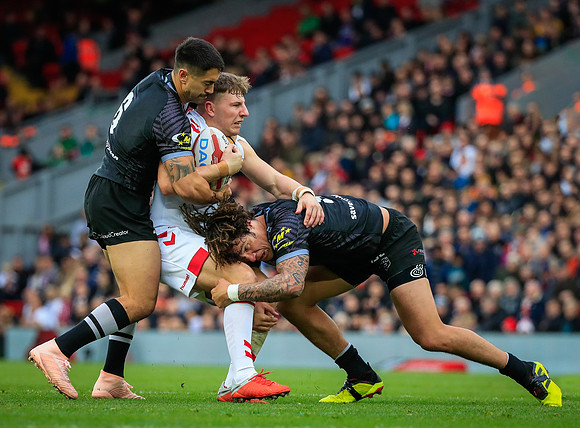 George Williams of England is stopped in his tracks