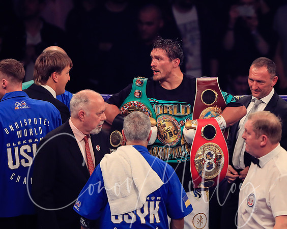 Oleksandr Usyk retains his four world title belts.