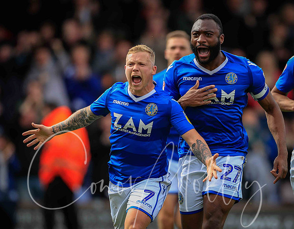 Elliott Durrell celebrates keeping Macclesfield Town in the Football League