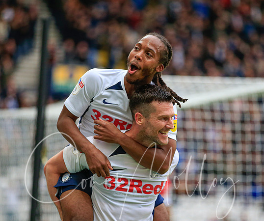 Daniel Johnson rides on the back of David Nugent