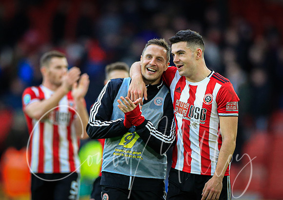 Phil Jagielka & John Egan celebrate