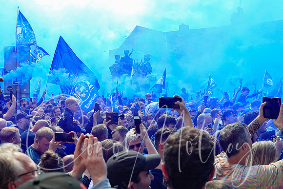 Everton fans await the team bus